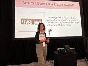 Paula Routly of Seven Days accepts awards