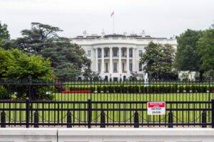 The White House surrounded by a fence